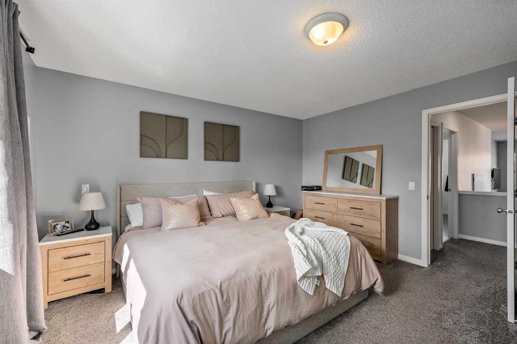 5 Copperpond Link Se, Calgary, AB - Indoor Photo Showing Bedroom