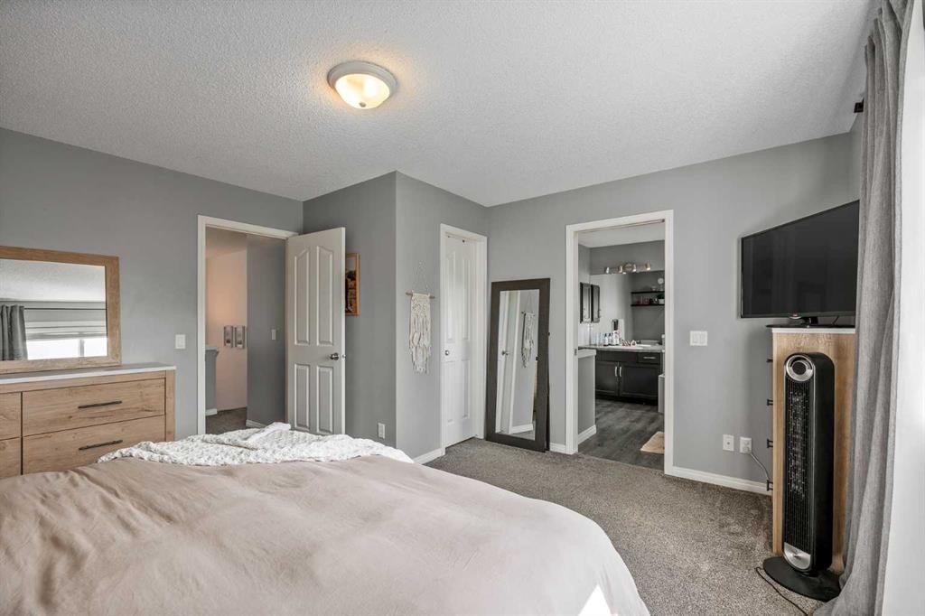 5 Copperpond Link Se, Calgary, AB - Indoor Photo Showing Bedroom