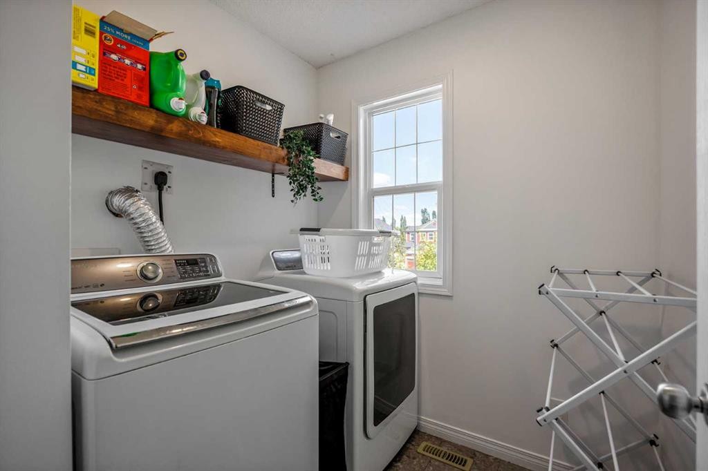 5 Copperpond Link Se, Calgary, AB - Indoor Photo Showing Laundry Room