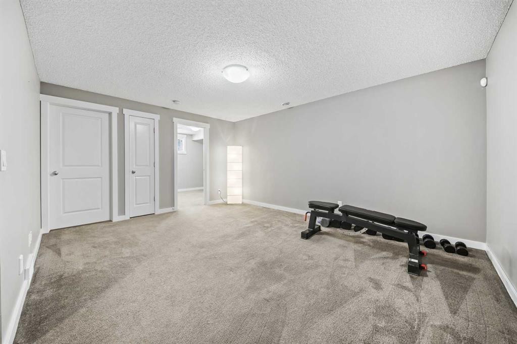 4728 Elgin Avenue Se, Calgary, AB - Indoor Photo Showing Gym Room