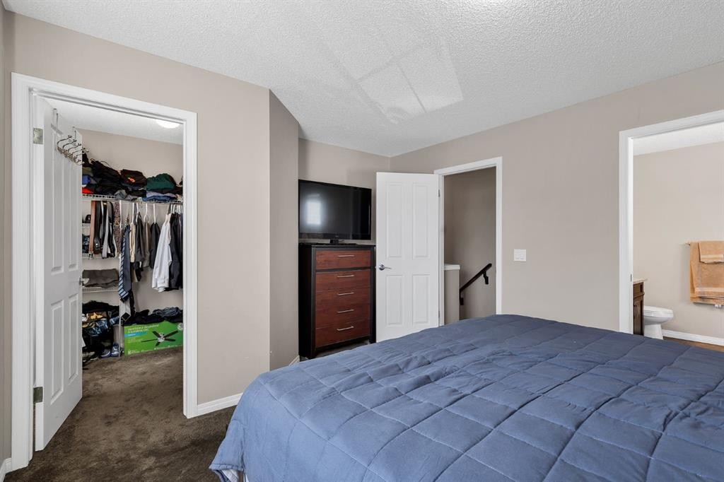 54 Autumn View Se, Calgary, AB - Indoor Photo Showing Bedroom