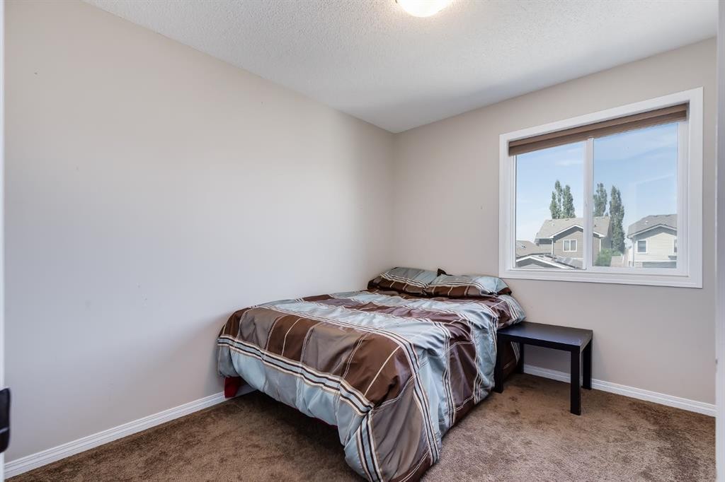 54 Autumn View Se, Calgary, AB - Indoor Photo Showing Bedroom