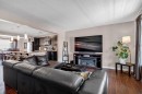 54 Autumn View Se, Calgary, AB  - Indoor Photo Showing Living Room 