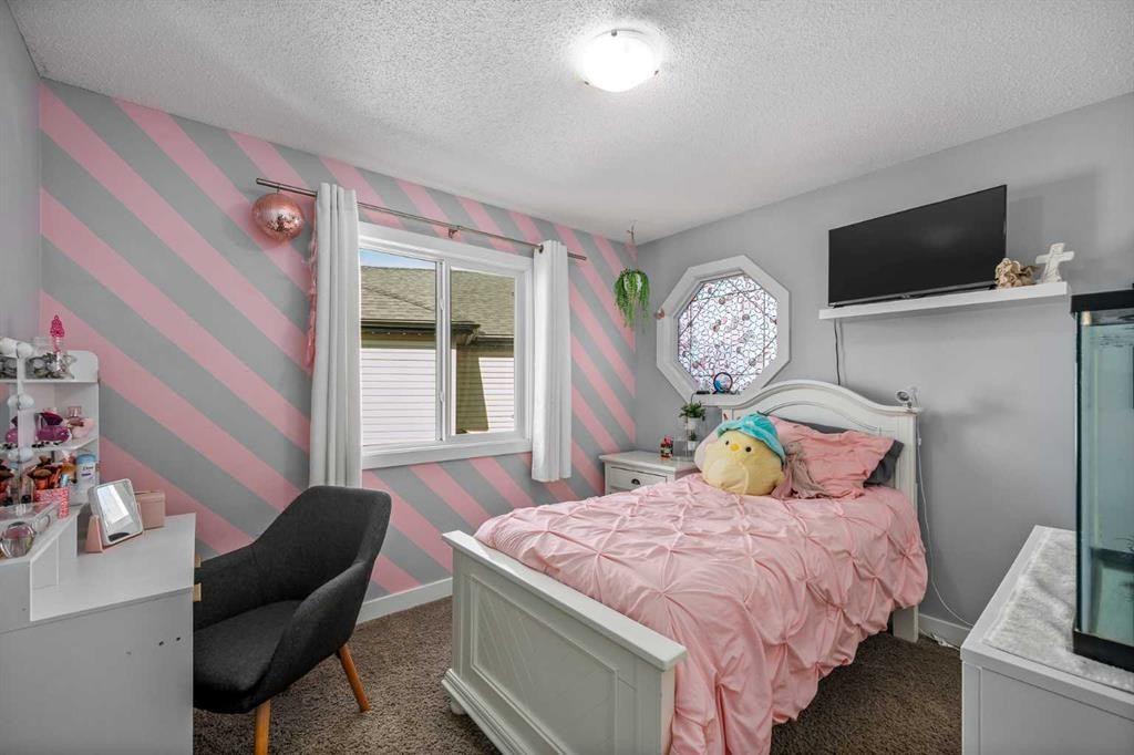 58 Copperstone Close Se, Calgary, AB - Indoor Photo Showing Bedroom