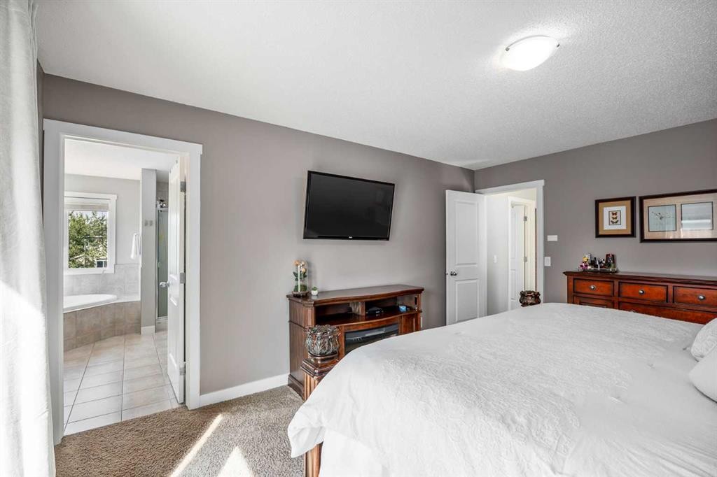 58 Copperstone Close Se, Calgary, AB - Indoor Photo Showing Bedroom
