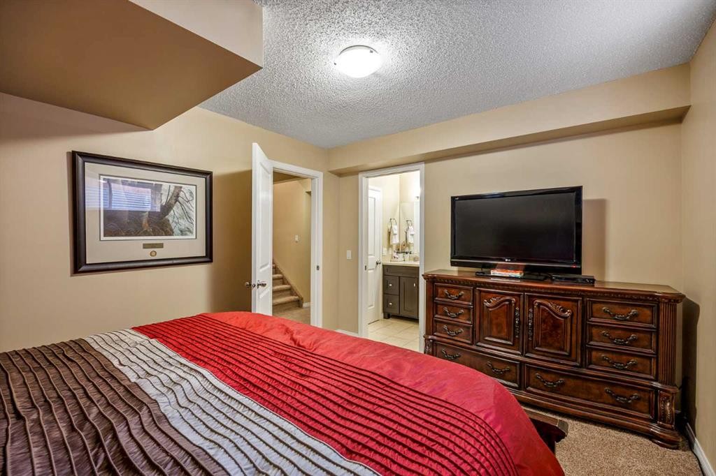 58 Copperstone Close Se, Calgary, AB - Indoor Photo Showing Bedroom