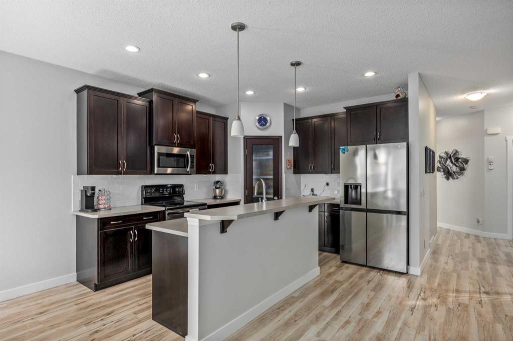 58 Copperstone Close Se, Calgary, AB - Indoor Photo Showing Kitchen With Upgraded Kitchen