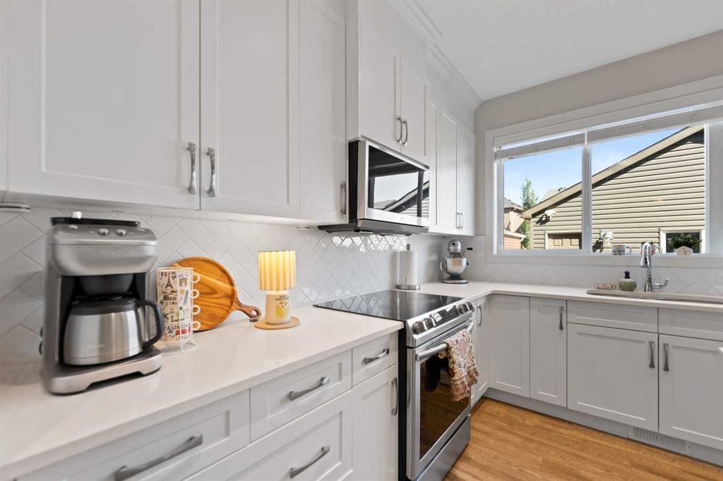 79 Legacy Glen Row Se, Calgary, AB - Indoor Photo Showing Kitchen With Upgraded Kitchen
