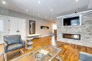 337 3 Avenue Ne, Calgary, AB  - Indoor Photo Showing Living Room With Fireplace 