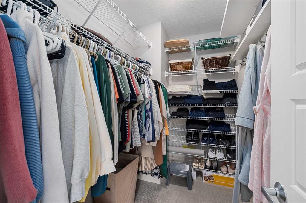 185 Cranbrook Villas Se, Calgary, AB - Indoor With Storage