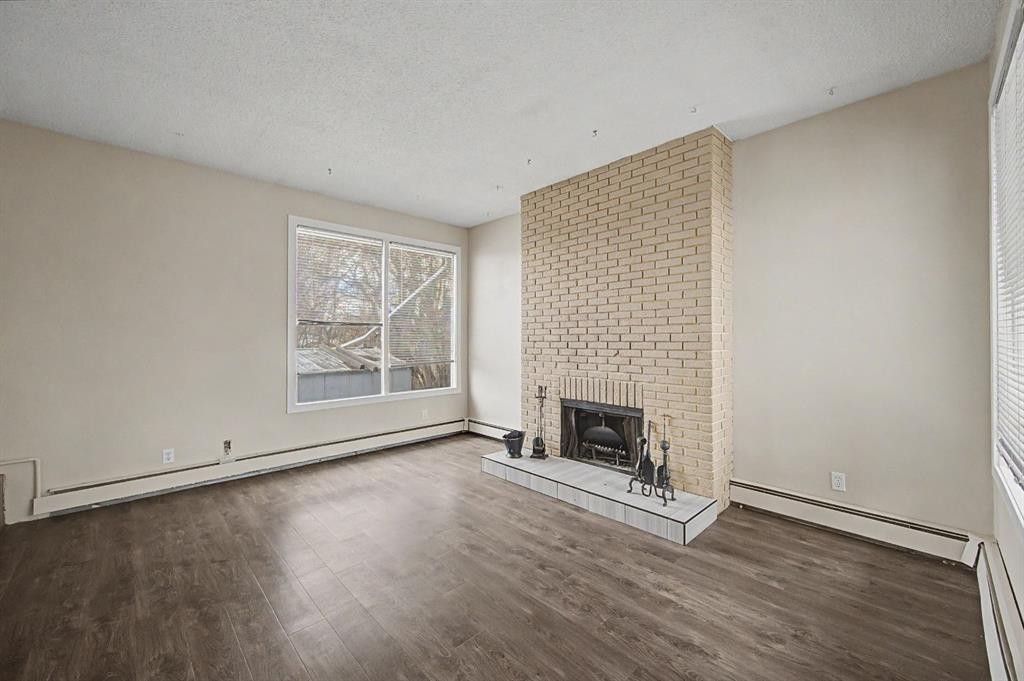 4004 79 Street Nw, Calgary, AB - Indoor Photo Showing Other Room With Fireplace