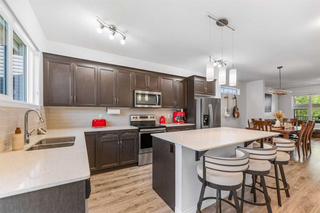 80 Legacy Glen Row Se, Calgary, AB - Indoor Photo Showing Kitchen With Double Sink