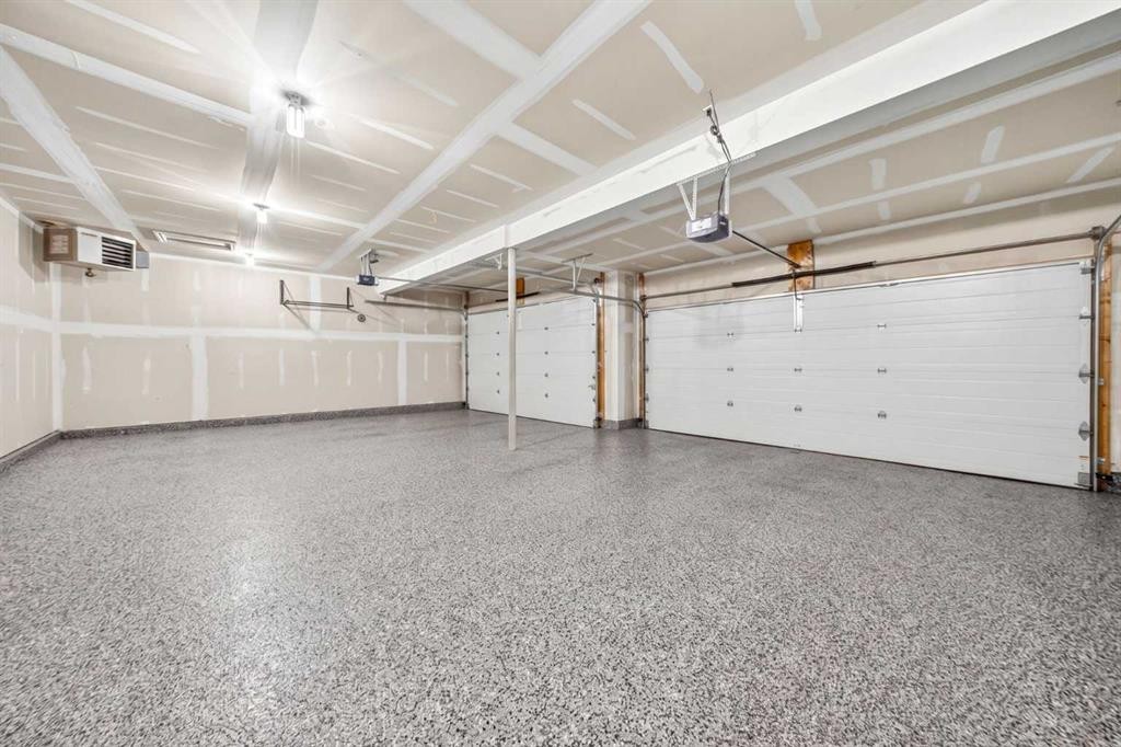 37 Rainbow Falls Boulevard, Chestermere, AB - Indoor Photo Showing Garage
