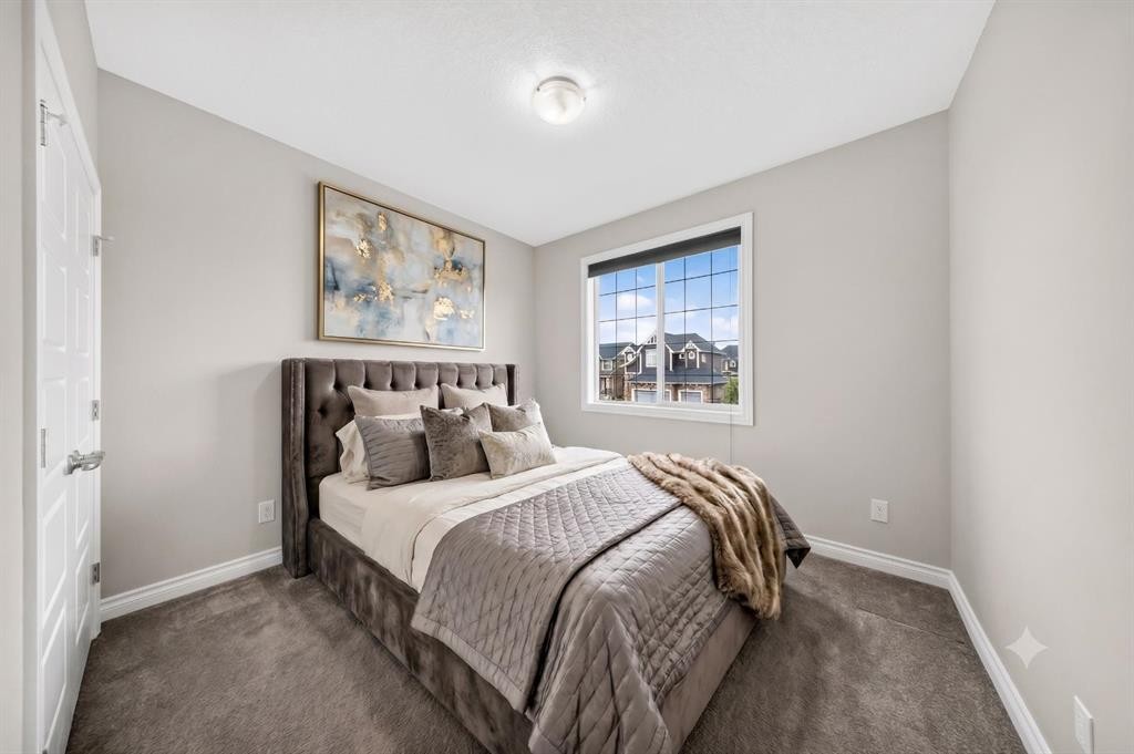 37 Rainbow Falls Boulevard, Chestermere, AB - Indoor Photo Showing Bedroom