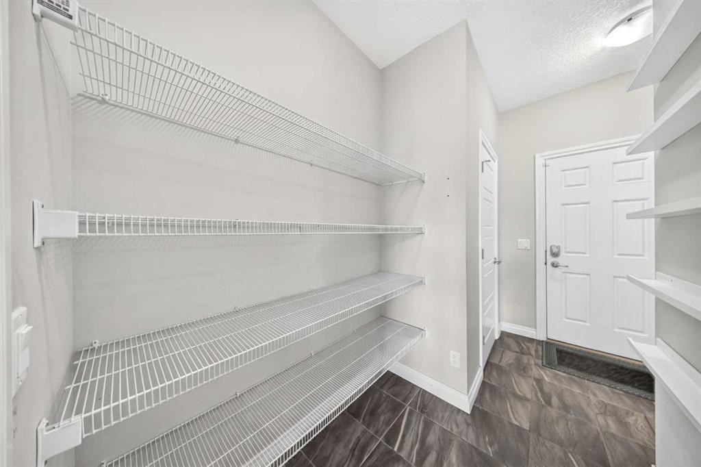 37 Rainbow Falls Boulevard, Chestermere, AB - Indoor With Storage