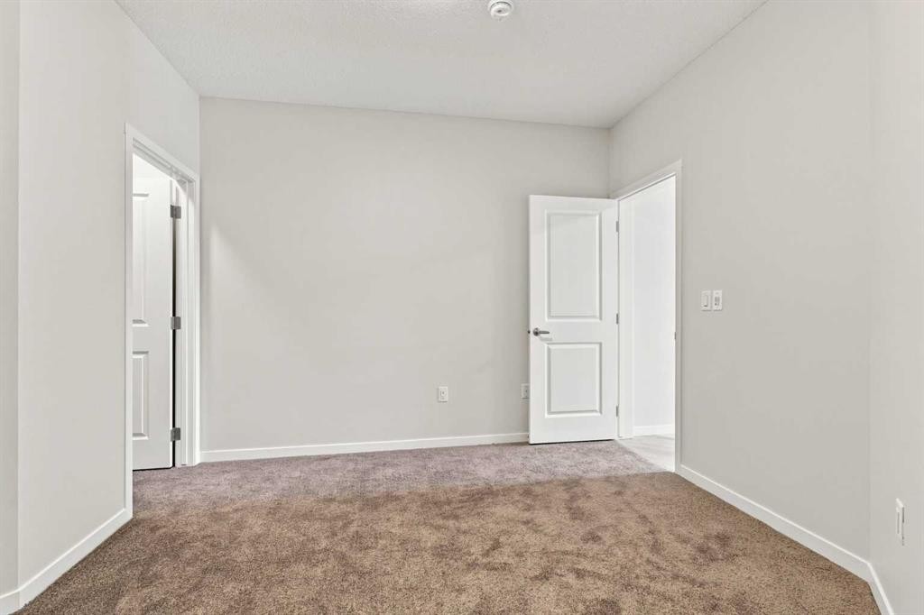 2306-33 Carringham Gate Nw, Calgary, AB - Indoor Photo Showing Other Room