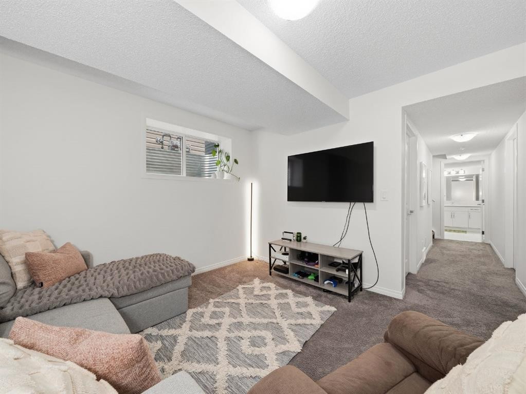 414 Windrow Common Sw, Airdrie, AB - Indoor Photo Showing Living Room