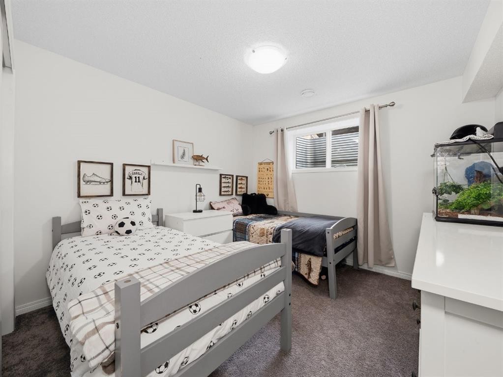 414 Windrow Common Sw, Airdrie, AB - Indoor Photo Showing Bedroom