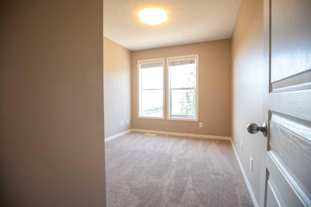 49 Auburn Bay Common Se, Calgary, AB - Indoor Photo Showing Other Room