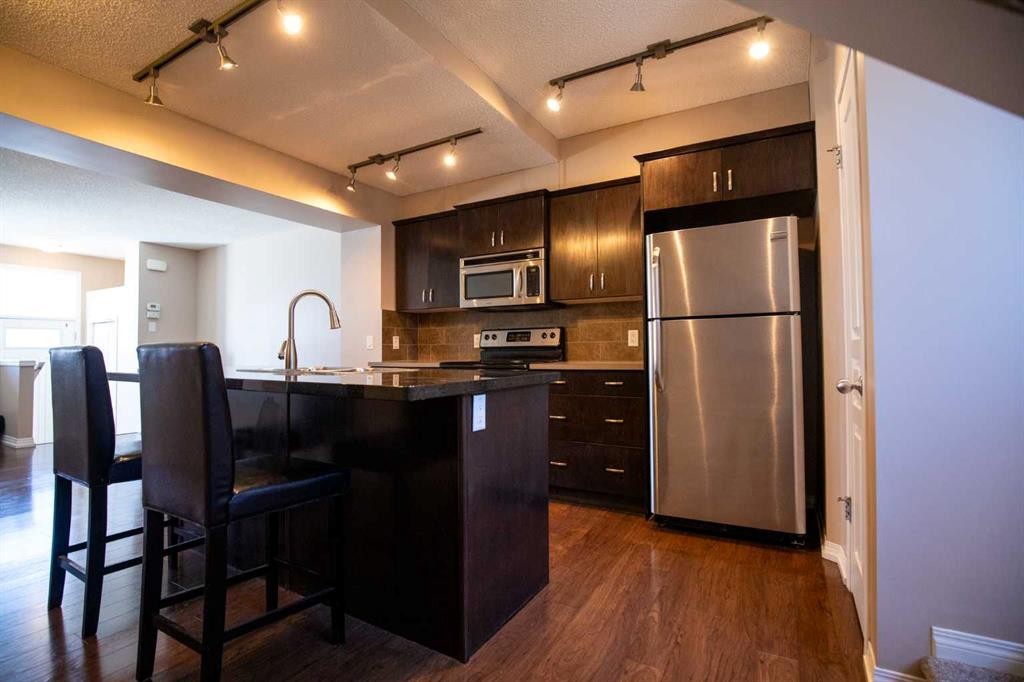 49 Auburn Bay Common Se, Calgary, AB - Indoor Photo Showing Kitchen With Upgraded Kitchen