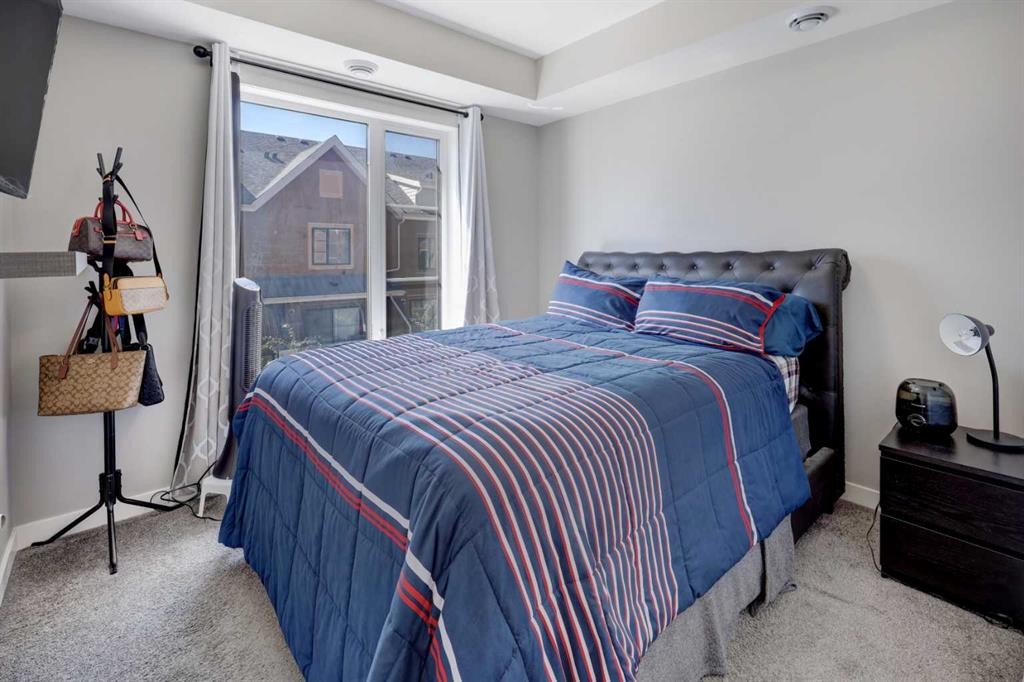 214 Livingston Common Ne, Calgary, AB - Indoor Photo Showing Bedroom
