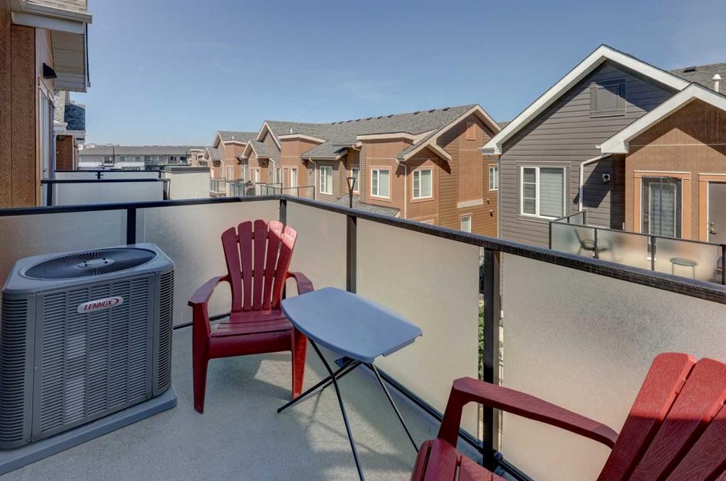 214 Livingston Common Ne, Calgary, AB - Outdoor With Balcony With Exterior