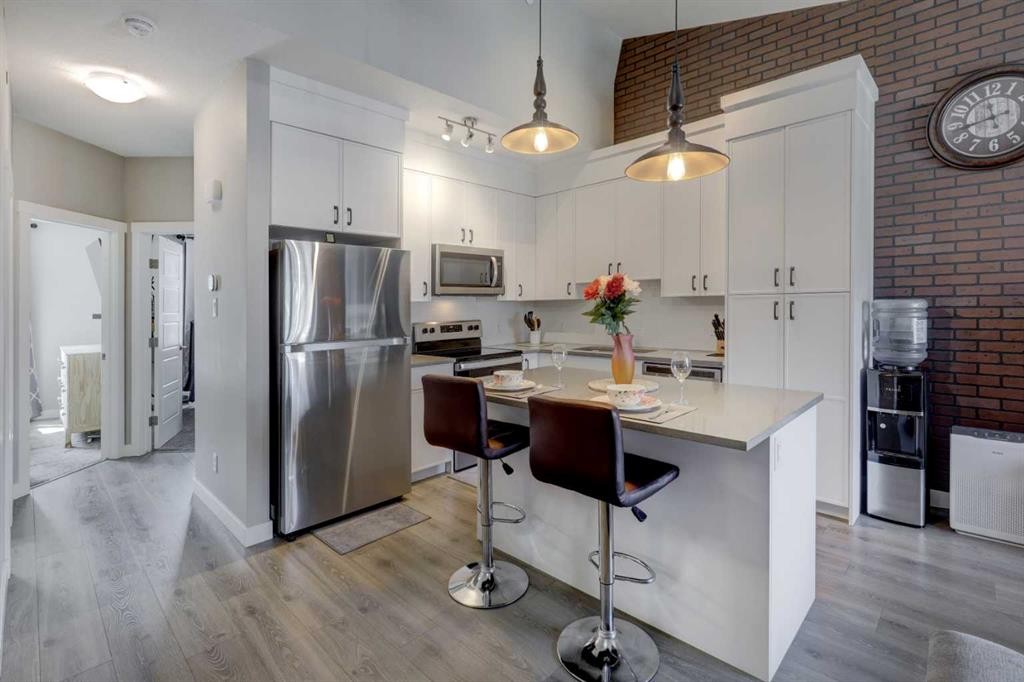 214 Livingston Common Ne, Calgary, AB - Indoor Photo Showing Kitchen With Stainless Steel Kitchen