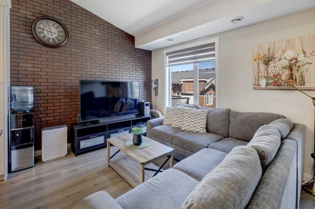 214 Livingston Common Ne, Calgary, AB - Indoor Photo Showing Living Room
