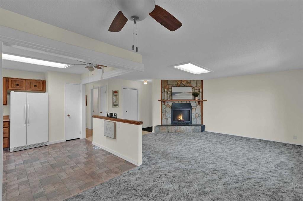 27 Bedridge Way Ne, Calgary, AB - Indoor With Fireplace