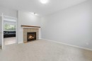 38 Silverado Skies Crescent Sw, Calgary, AB  - Indoor Photo Showing Other Room With Fireplace 