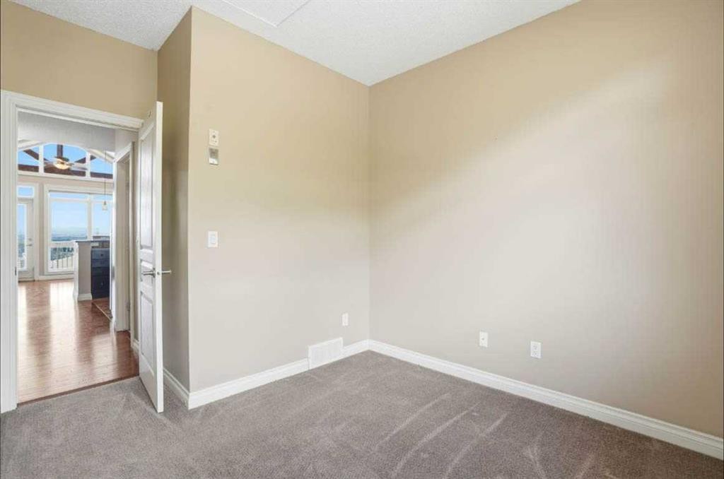 11-148 Rockyledge View Nw, Calgary, AB - Indoor Photo Showing Other Room