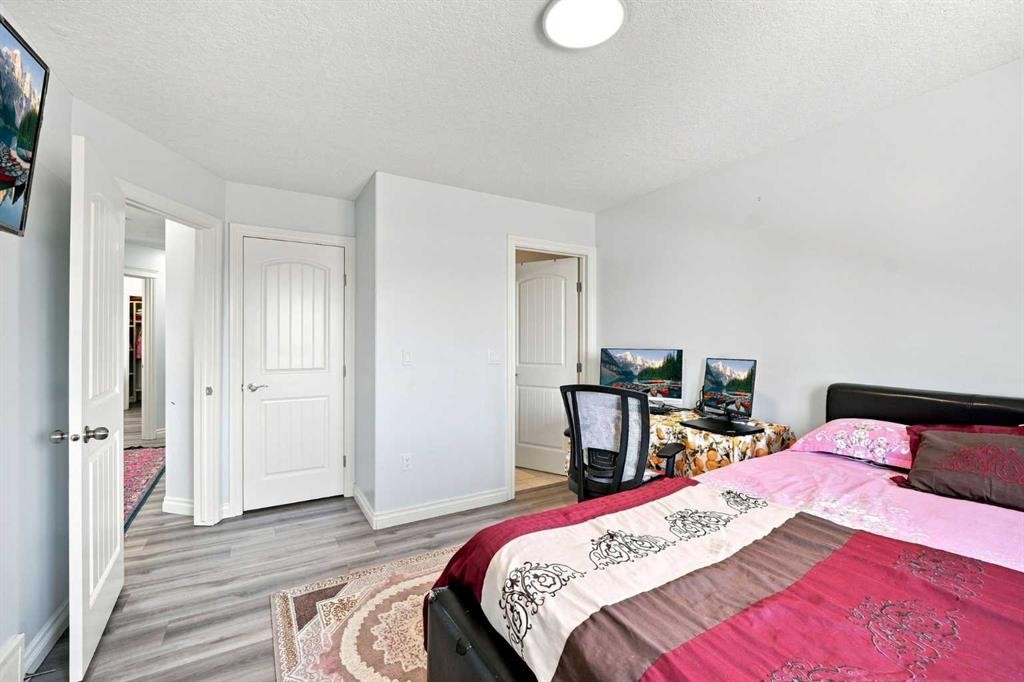 201 Saddlelake Drive Ne, Calgary, AB - Indoor Photo Showing Bedroom