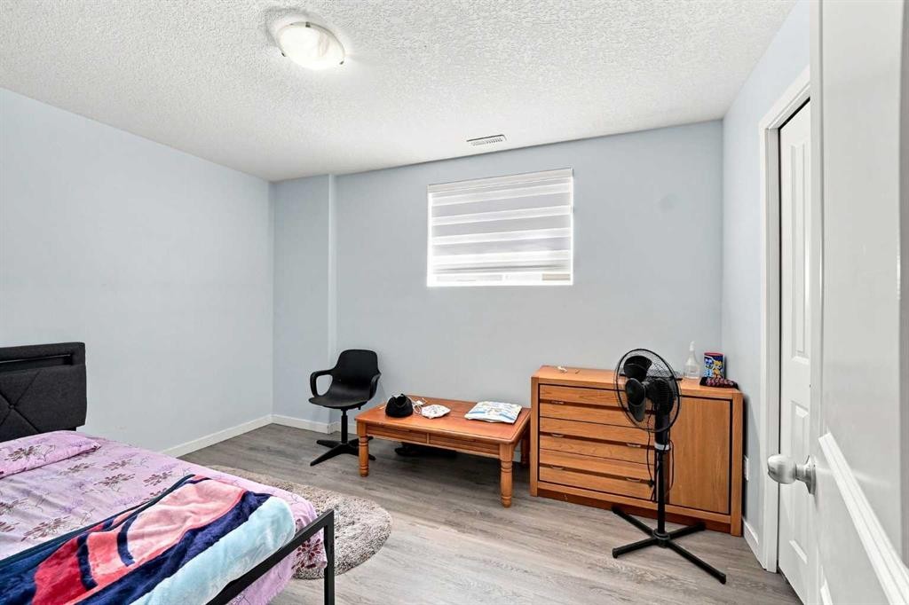 201 Saddlelake Drive Ne, Calgary, AB - Indoor Photo Showing Bedroom