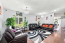 201 Saddlelake Drive Ne, Calgary, AB  - Indoor Photo Showing Living Room 
