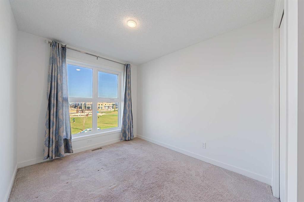83 Savanna Park Ne, Calgary, AB - Indoor Photo Showing Other Room
