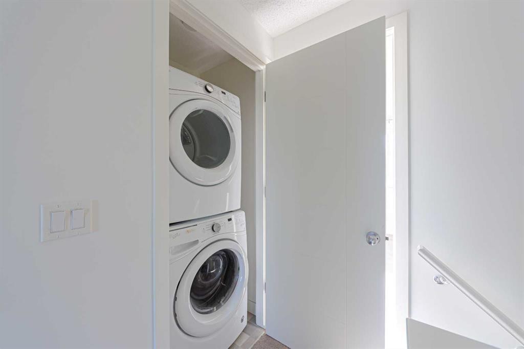 83 Savanna Park Ne, Calgary, AB - Indoor Photo Showing Laundry Room