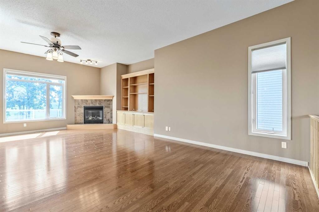 315 Willow Ridge Way, Diamond Valley, AB - Indoor With Fireplace