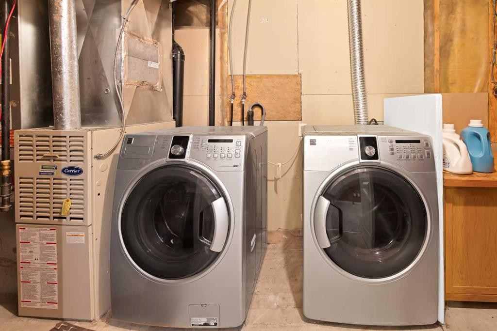 54 Martinridge Road Ne, Calgary, AB - Indoor Photo Showing Laundry Room