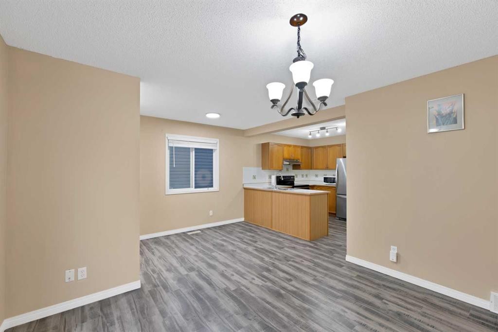 54 Martinridge Road Ne, Calgary, AB - Indoor Photo Showing Other Room