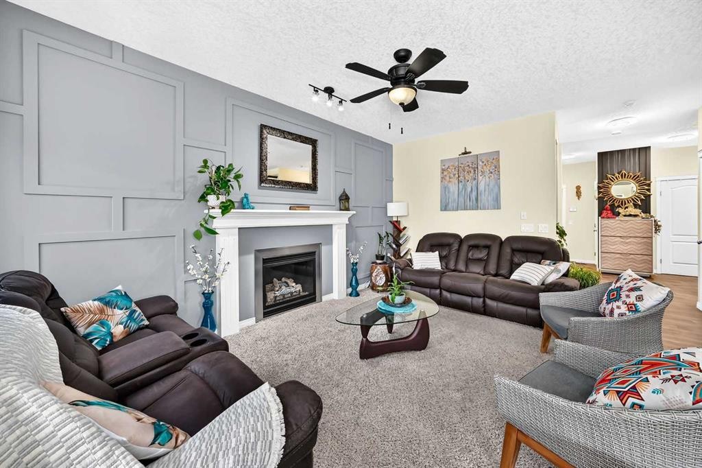 157 Sage Valley Road Nw, Calgary, AB - Indoor Photo Showing Living Room With Fireplace