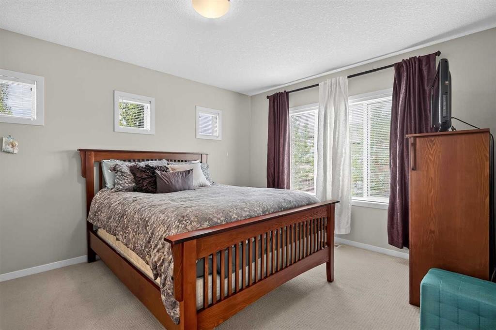 202 Copperpond Row Se, Calgary, AB - Indoor Photo Showing Bedroom