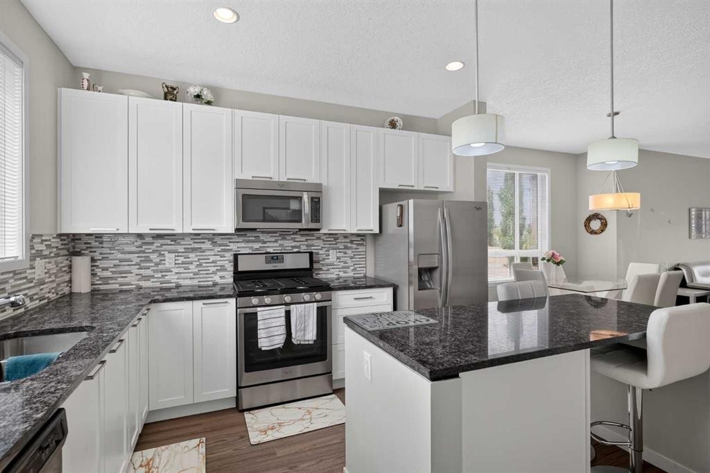 202 Copperpond Row Se, Calgary, AB - Indoor Photo Showing Kitchen With Upgraded Kitchen