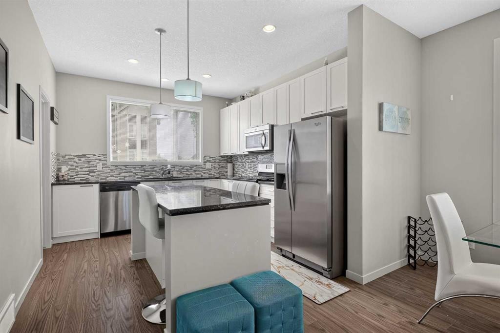 202 Copperpond Row Se, Calgary, AB - Indoor Photo Showing Kitchen With Upgraded Kitchen