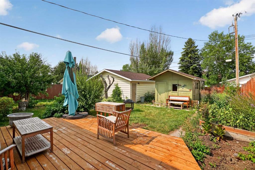 7935 Huntwick Hill Ne, Calgary, AB - Outdoor With Deck Patio Veranda With Exterior