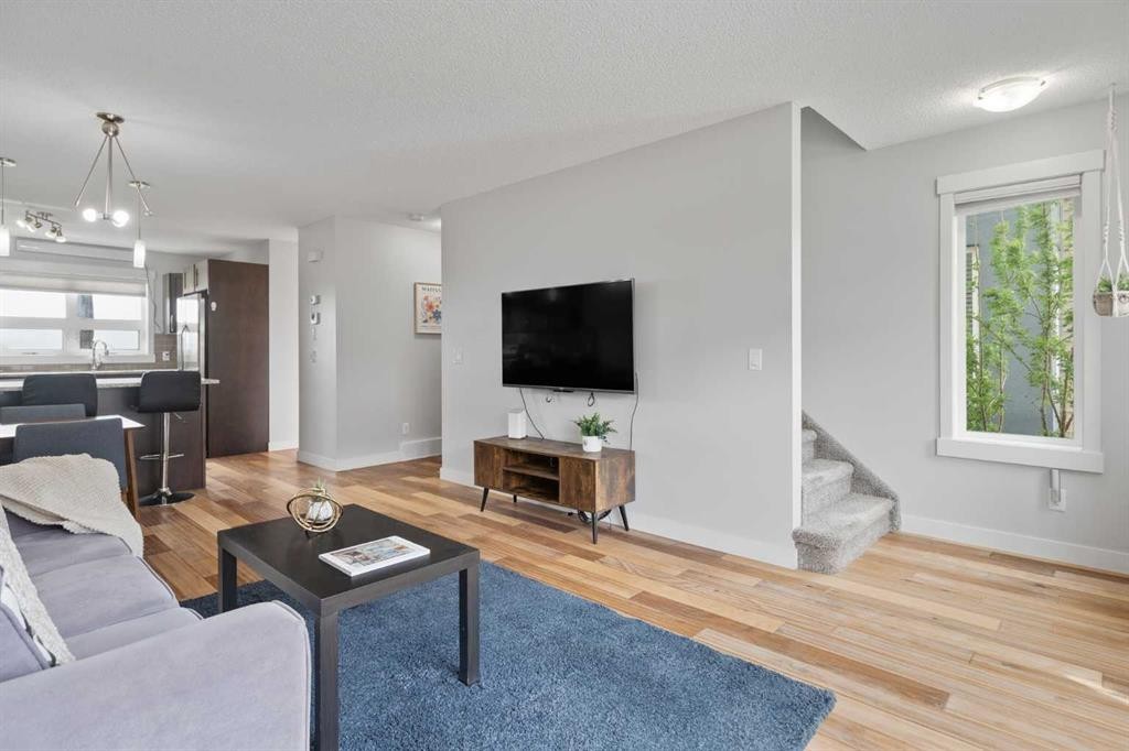 230 Covecreek Circle Ne, Calgary, AB - Indoor Photo Showing Living Room