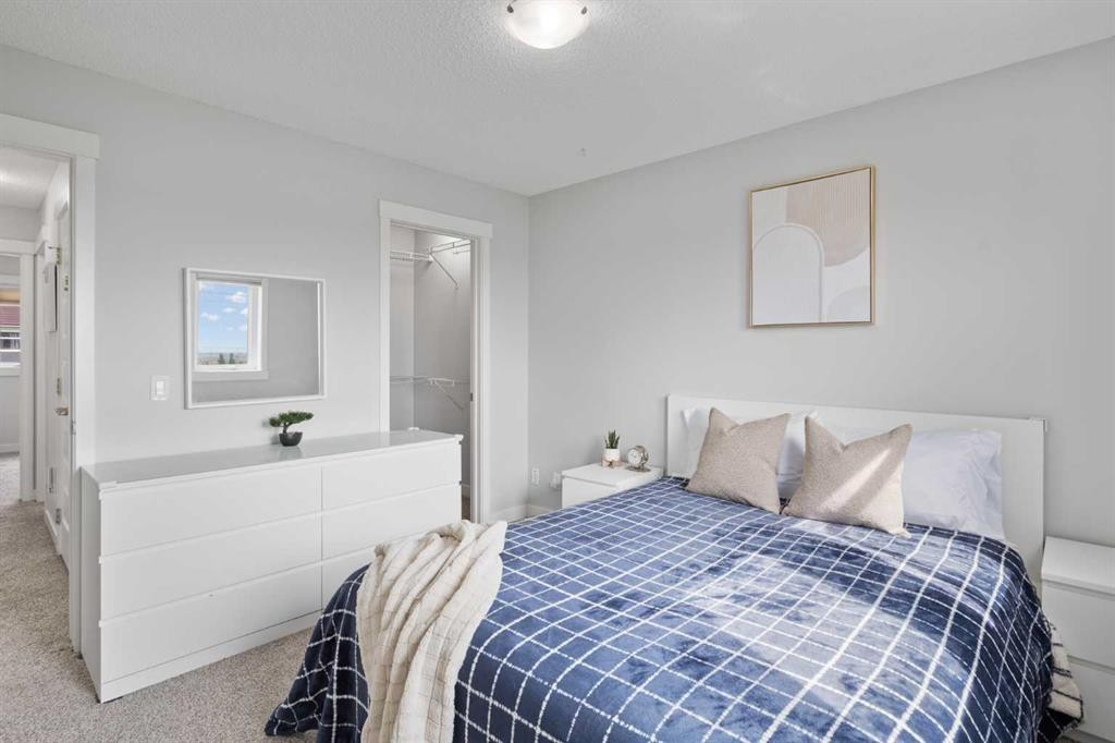 230 Covecreek Circle Ne, Calgary, AB - Indoor Photo Showing Bedroom