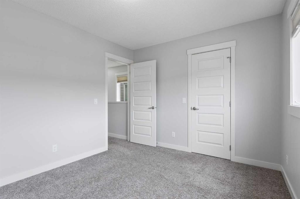 230 Covecreek Circle Ne, Calgary, AB - Indoor Photo Showing Other Room