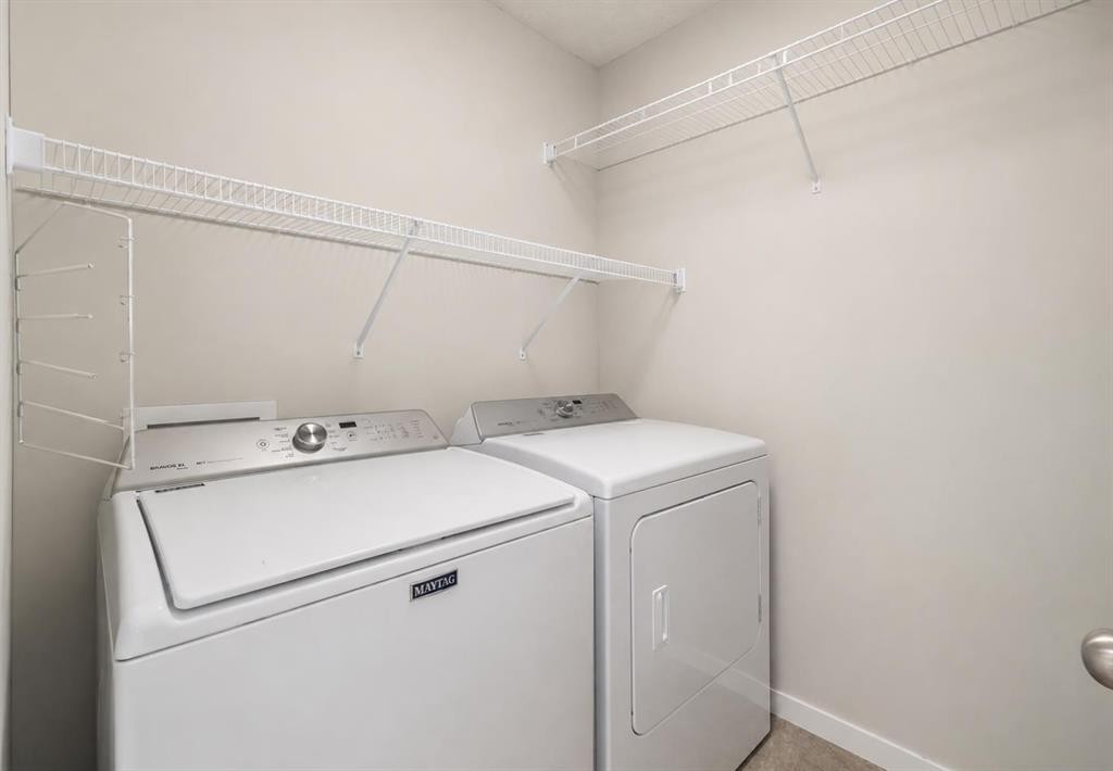 719 Mahogany Boulevard Se, Calgary, AB - Indoor Photo Showing Laundry Room