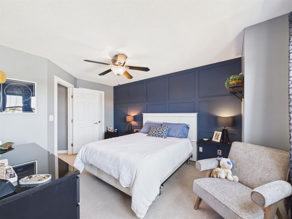 2049 New Brighton Gardens Se, Calgary, AB - Indoor Photo Showing Bedroom