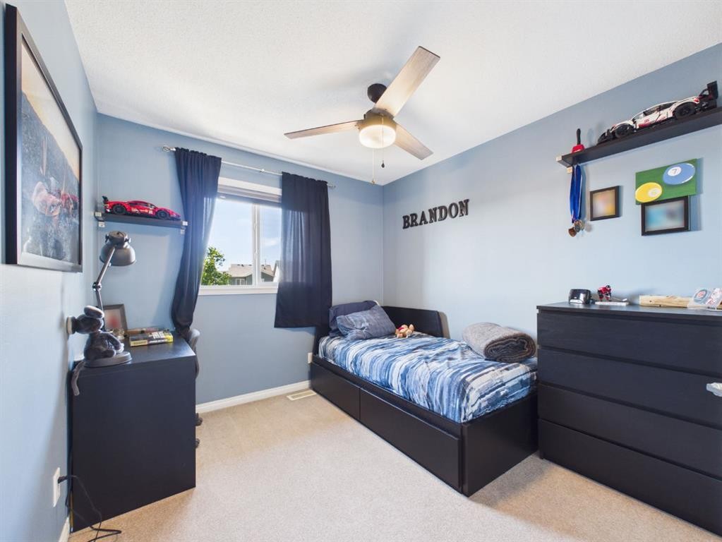 2049 New Brighton Gardens Se, Calgary, AB - Indoor Photo Showing Bedroom